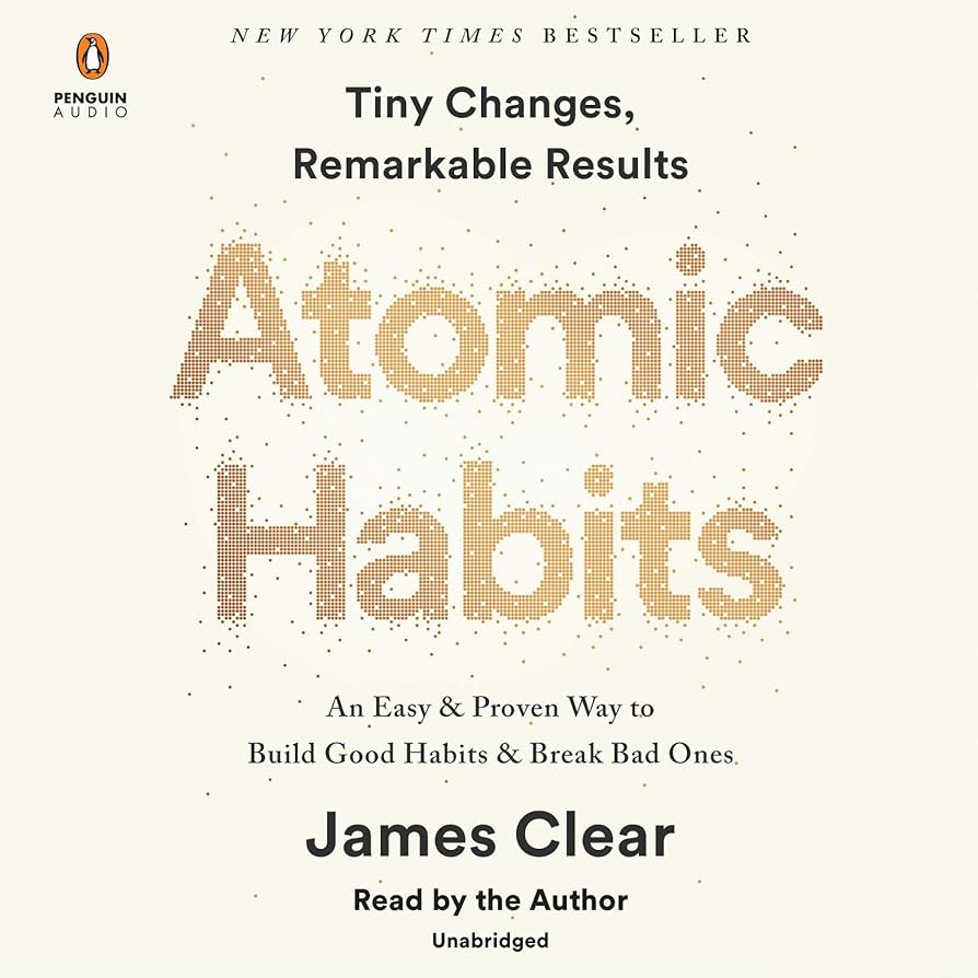 Audiobook cover for "Atomic Habits: Tiny Changes, Remarkable Results" by James Clear, featuring the title text built from small golden dots on an off-white background, with Penguin Audio branding at the top left.